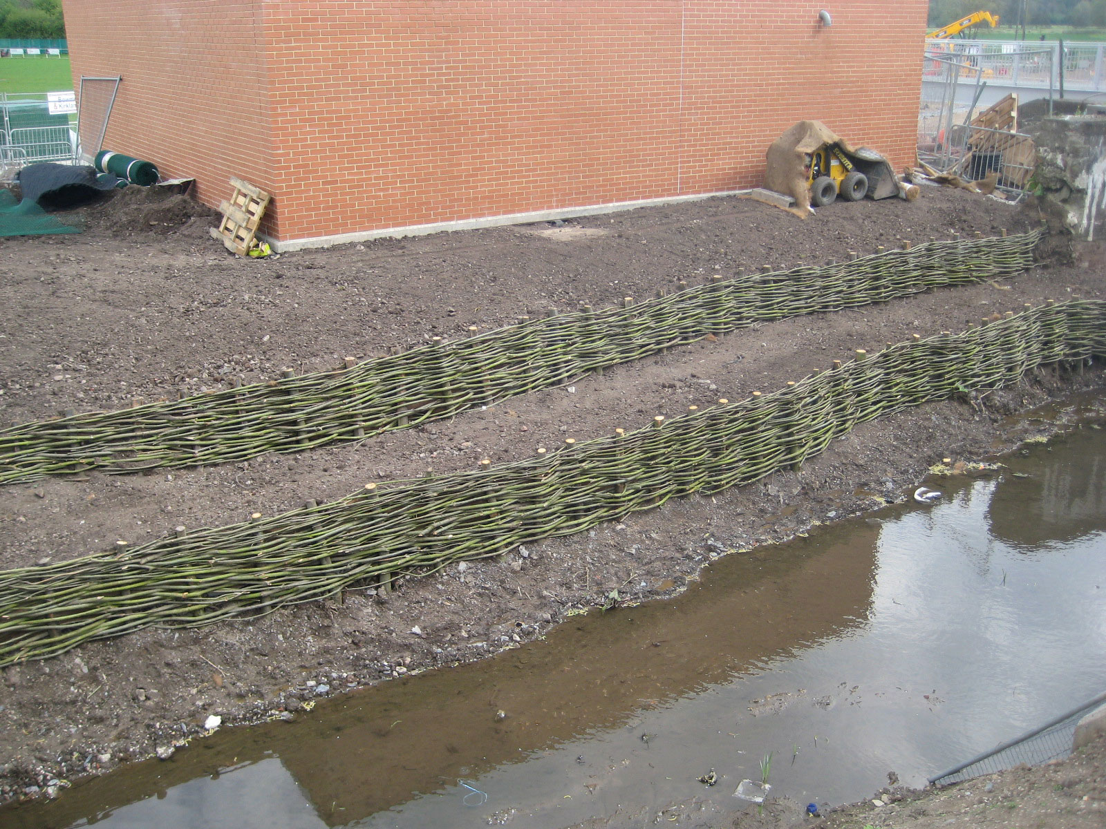 <span>Ref: D8</span><br>The back filled soil will eventually become colonised by natural river side vegetation.